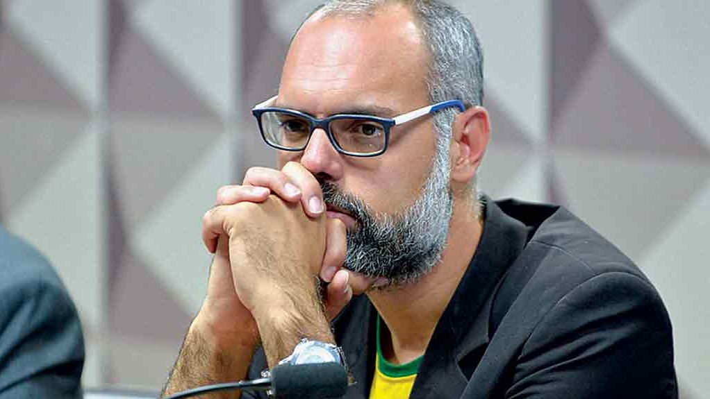 A caçada de Dino por Allan dos Santos: ministro diz que EUA querem mais informações para decidir extraditar jornalista